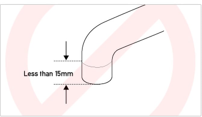 Vertical section of spout less than 15mm in length